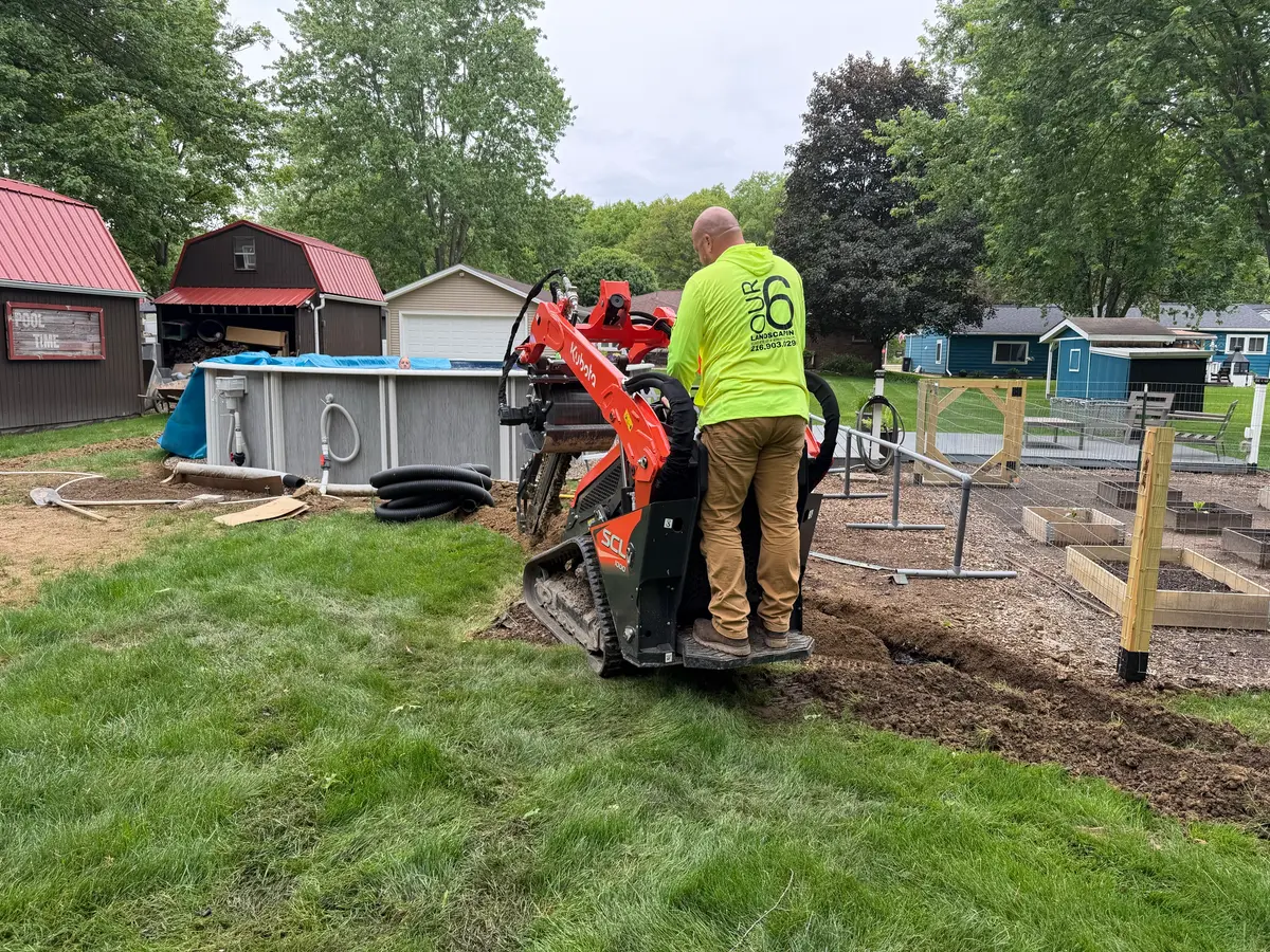 Crew building raised planting beds