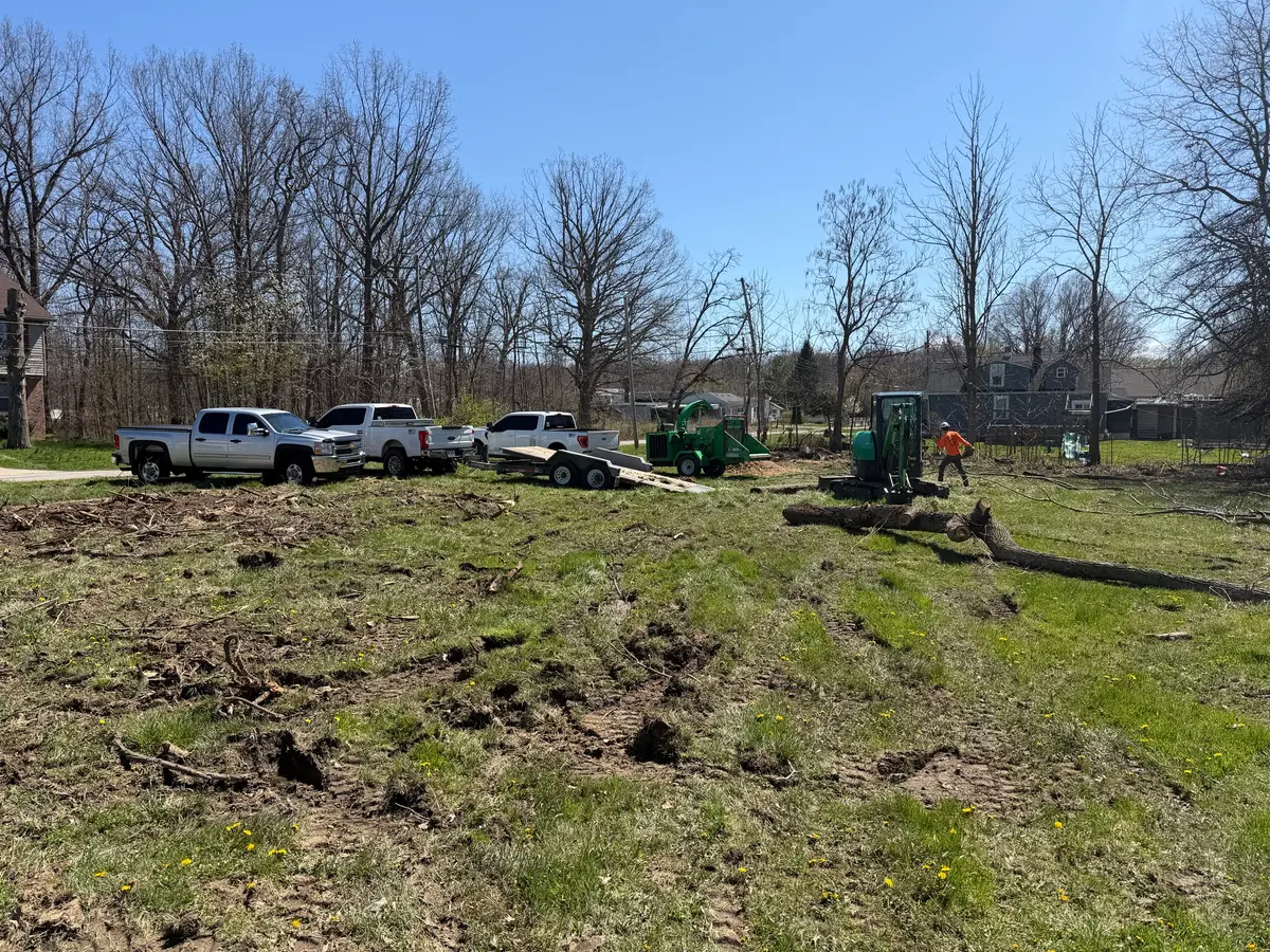 Cleared lot with crew and equipment on site